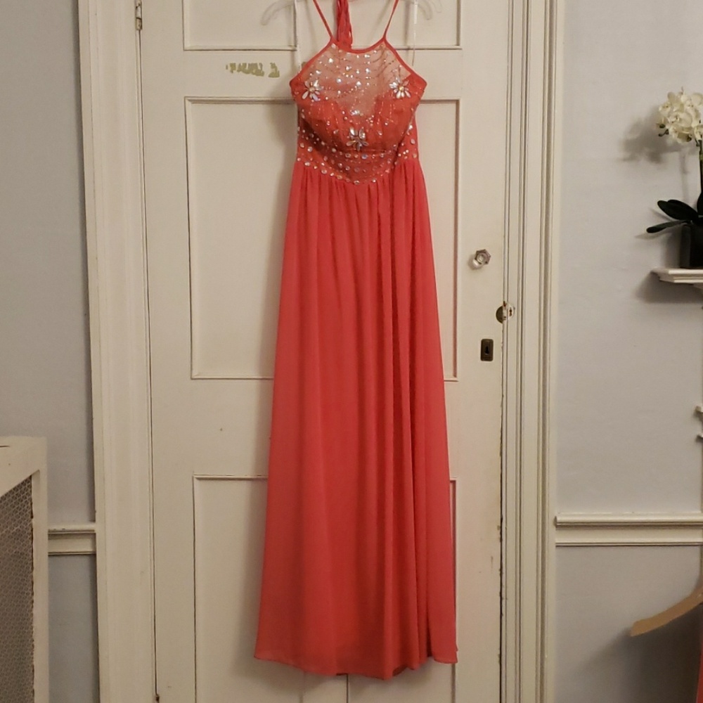 Salmon peach floor length gown.